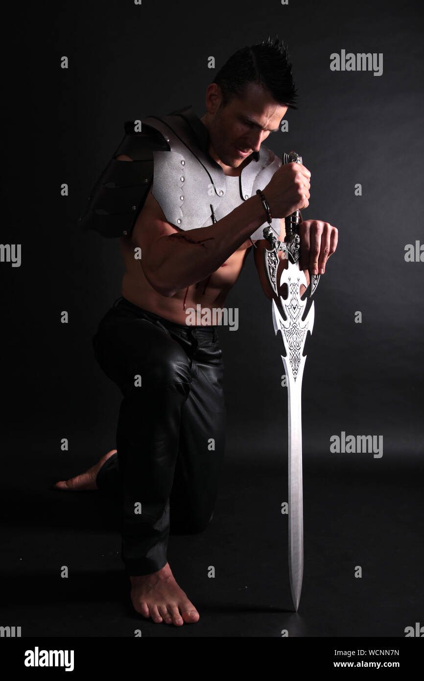 Kneeling warrior hires stock photography and images Alamy