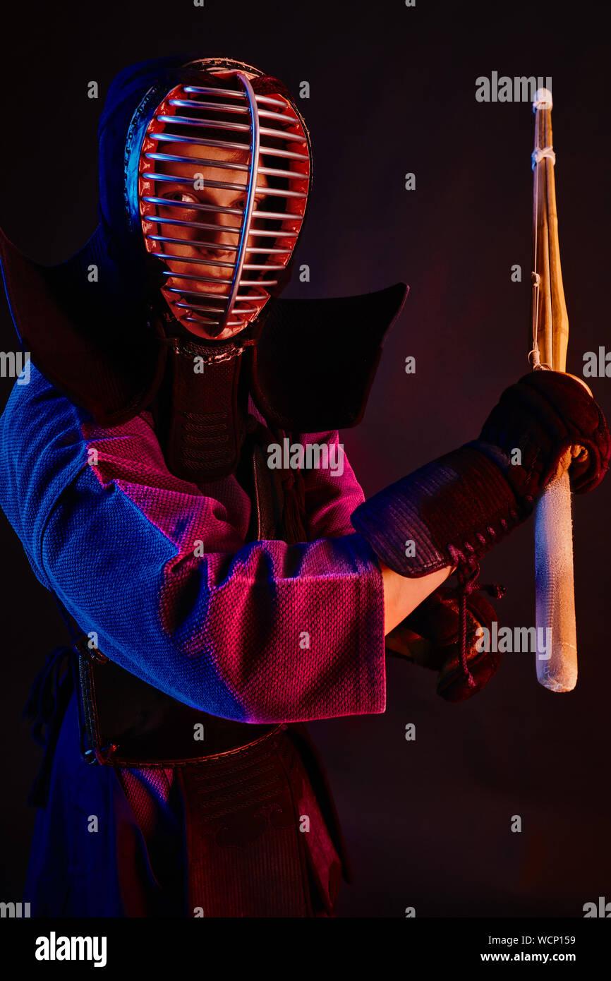 Close up shot, Kendo fighter wearing in an armor, traditional kimono