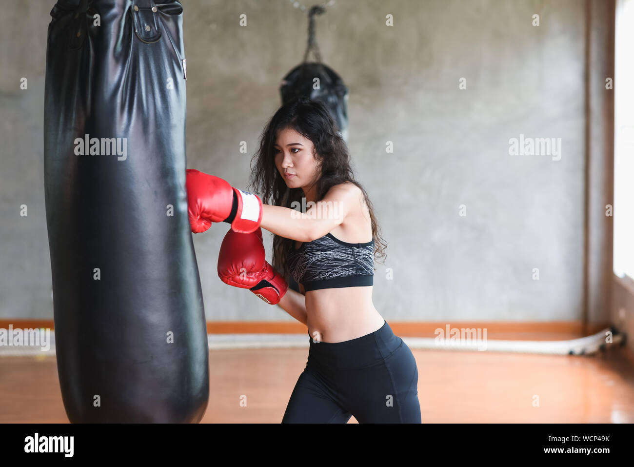 Punching bag woman hires stock photography and images Alamy
