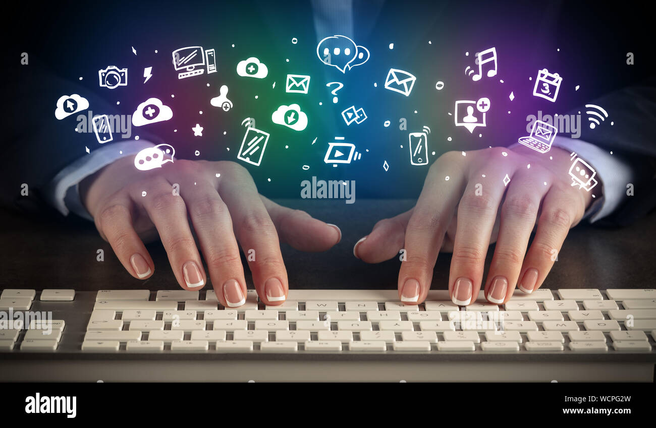 Blogger woman typing on keyboard with drawn application icons around ...