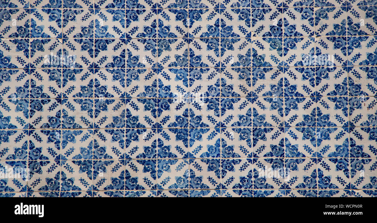 Traditional tiles on the facade of an old house in Porto, Portugal Stock Photo