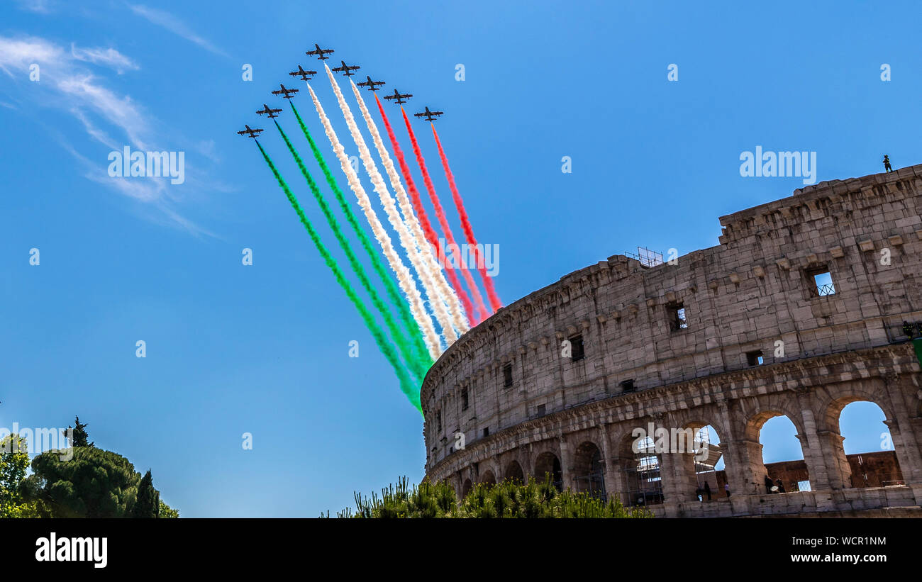 Rome, Italy - 2 June 2019: Italian acrobatic aerial team 'Frecce Tricolore' flying over the Colosseum at the Republic Day in Rome, Italy Stock Photo
