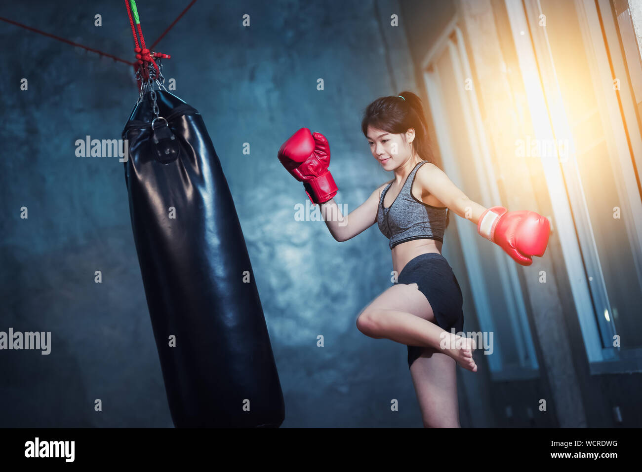 Punching bag woman hires stock photography and images Alamy