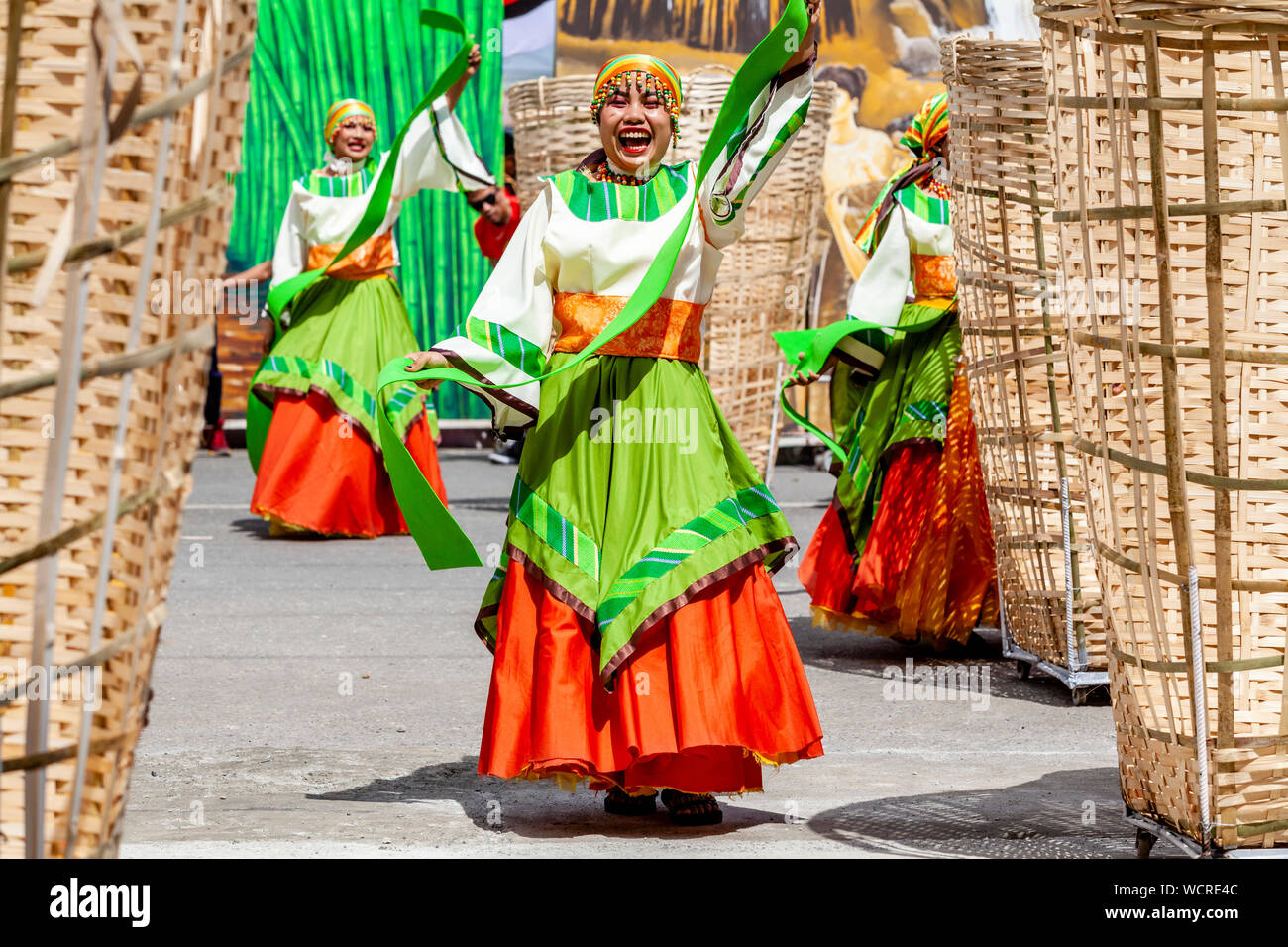 Young Filipino Women Performing In The Kasadyahan Contest, Dinagyang Festival, Iloilo City, Panay Island, The Philippines. Stock Photo