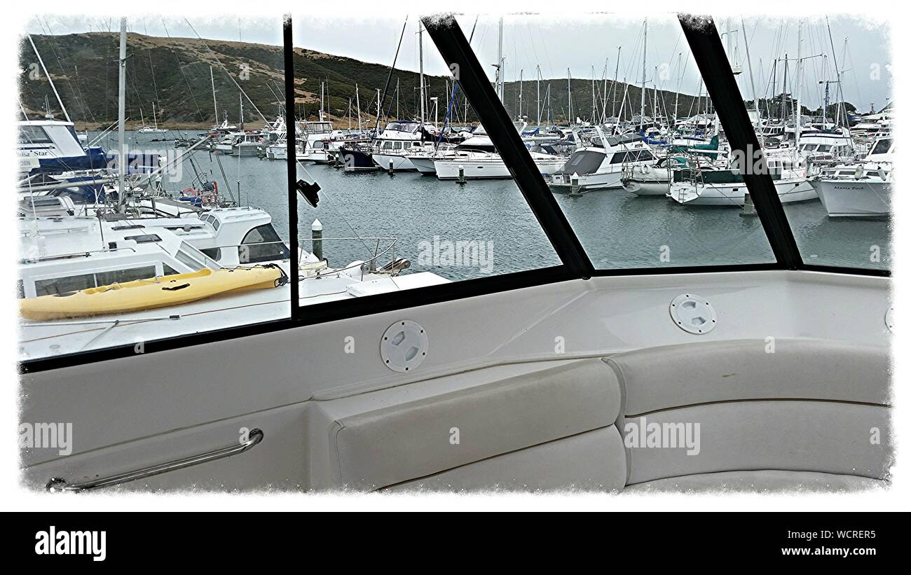 Boats Docked At Harbor Stock Photo Alamy
