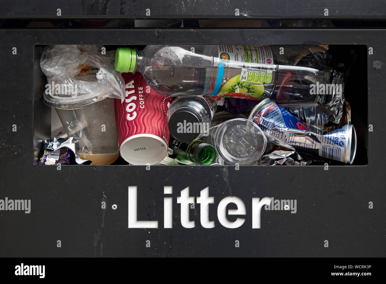 Closeup of a full litter bin in Edinburgh, Scotland, UK. Stock Photo