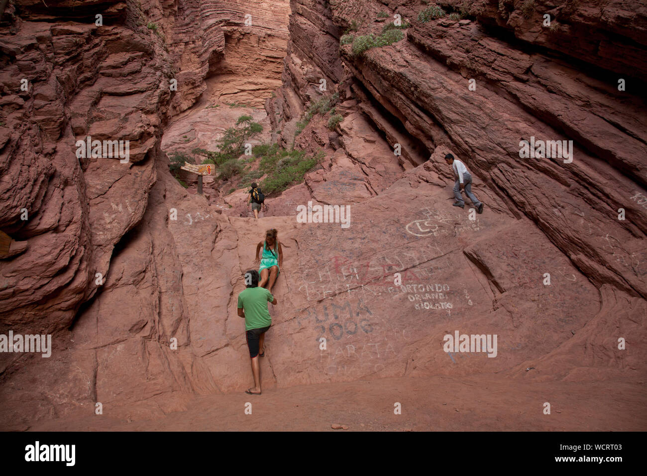 Visitors To The Throat s Devil Canyon And Rock Formations In The visitors-to-the-throat-s-devil-canyon-and-rock-formations-in-the