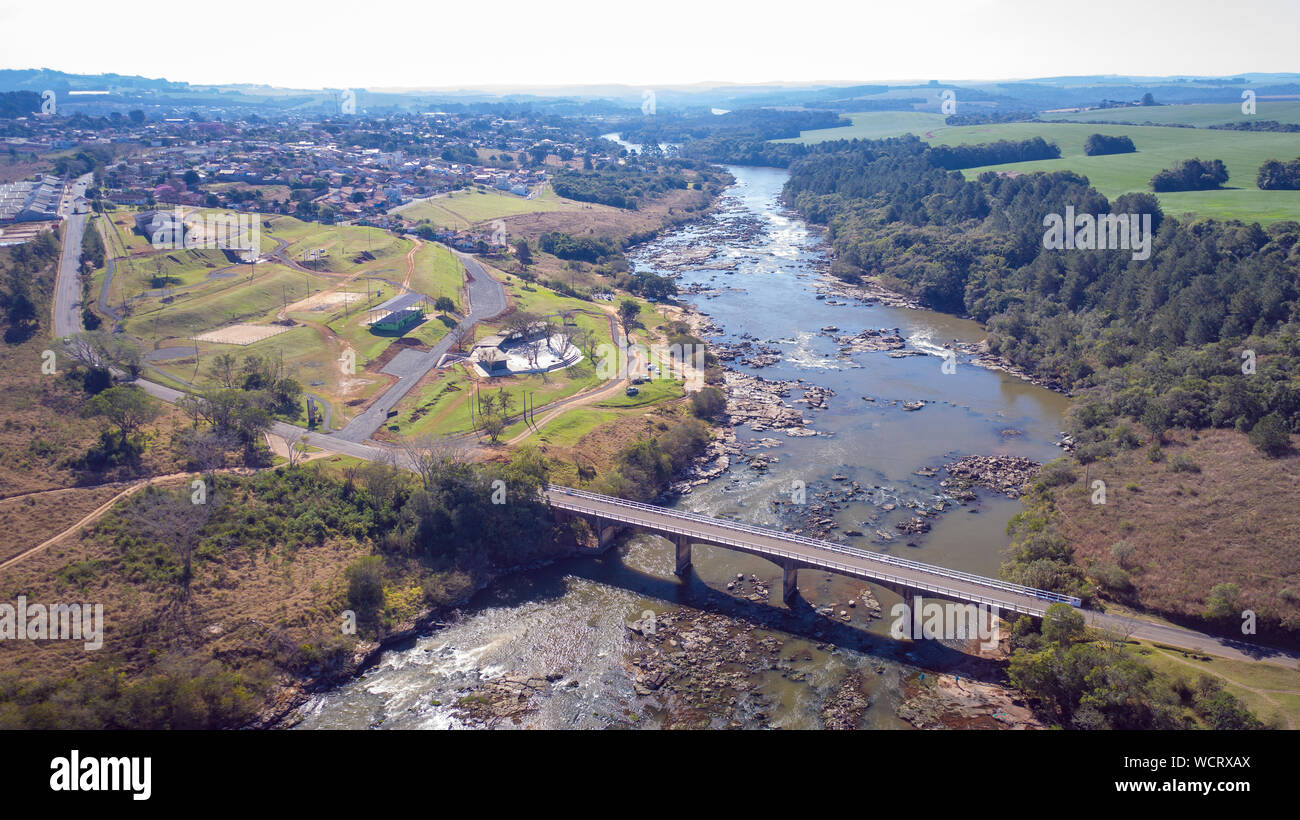 Flight over the Tibagi river in the Tibagi city of Parana state, Brazil. Stock Photo