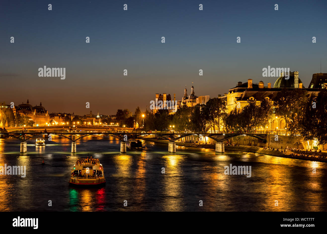 Pont des arts at nightfall - Paris, France Stock Photo