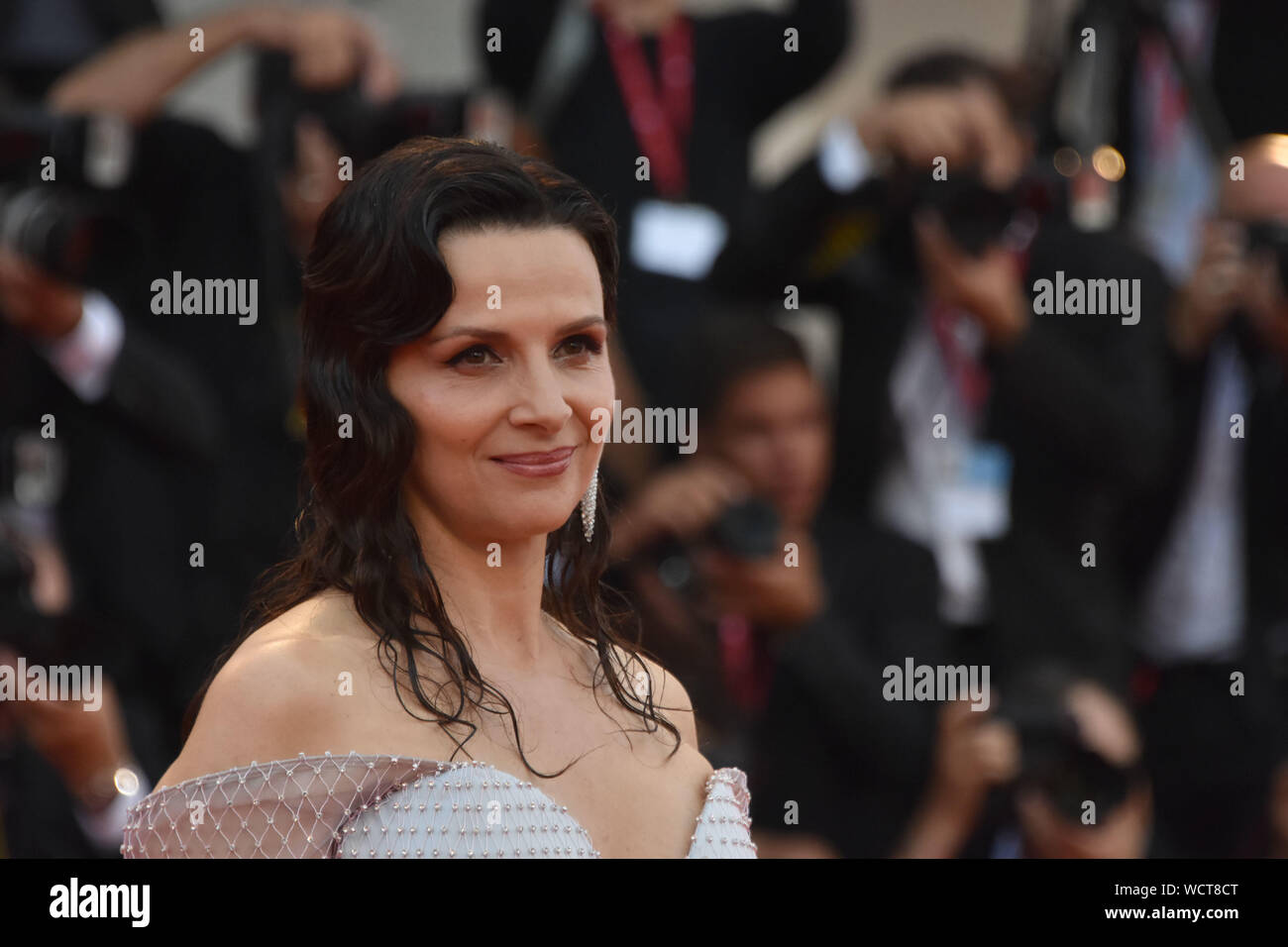 VENICE, Italy. 28th Aug, 2019. Juliette Binoche walks the red carpet ahead of the opening ceremony during the 76th Venice Film Festival at Sala Casino on August 28, 2019 in Venice, Italy. Credit: Andrea Merola/Awakening/Alamy Live News Stock Photo