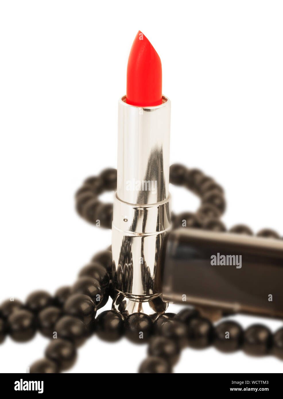 Red Lipstick Against White Background Stock Photo