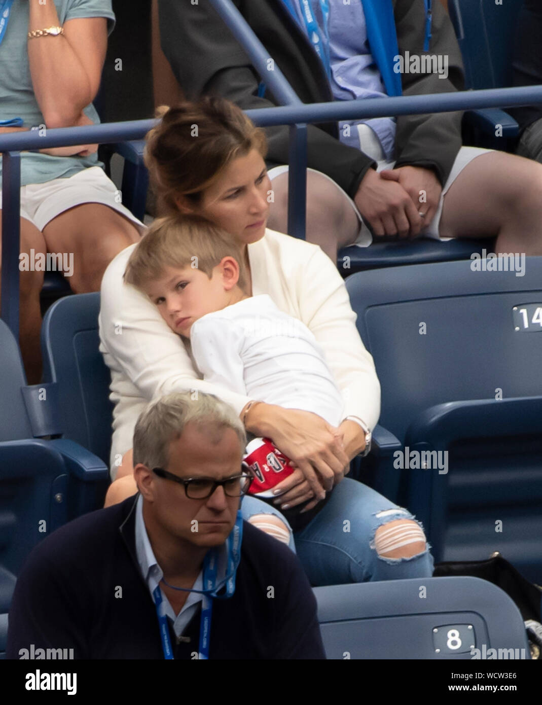 August 28, 2019: Mirka Federer holds her son during Roger Federer's match  at the US Open being played at Billie Jean King National Tennis Center in  Flushing, Queens, NY. © Jo Becktold