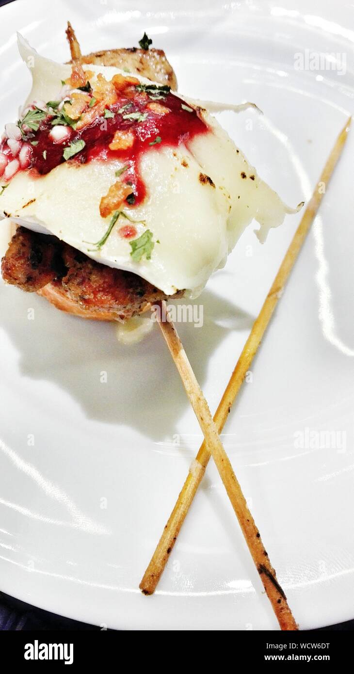 High Angle View Of Pincho Served On Plate Stock Photo