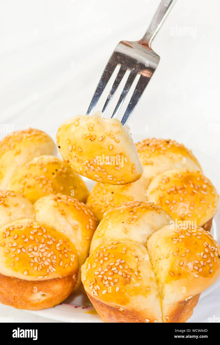 Soft NoKnead Heart shaped Buttery Dinner Rolls with Sesame seeds Stock