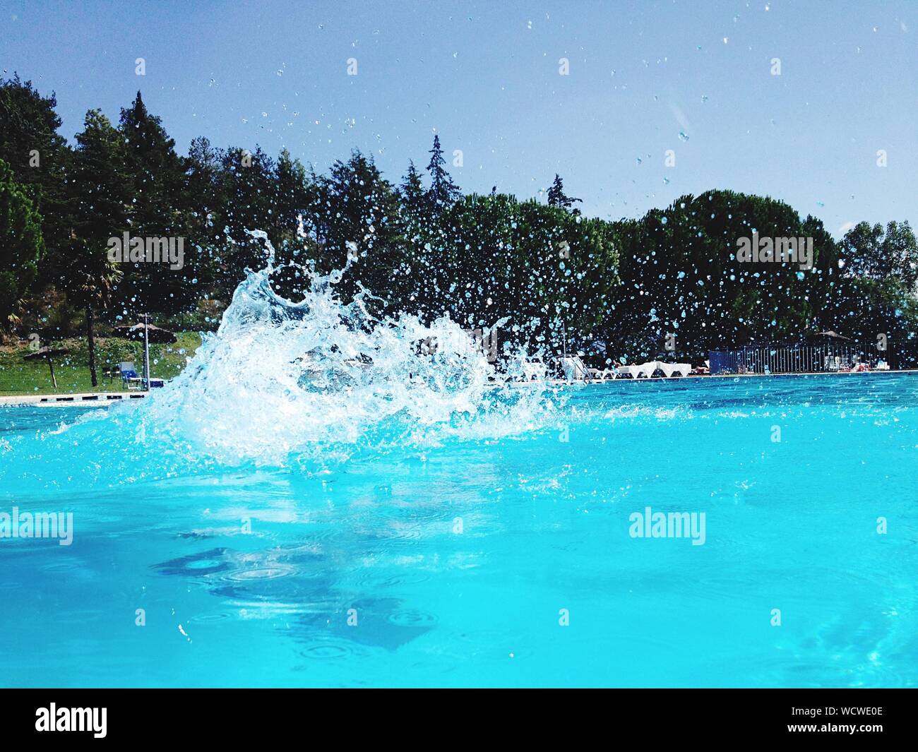 Water Splashing In Swimming Pool Stock Photo Alamy