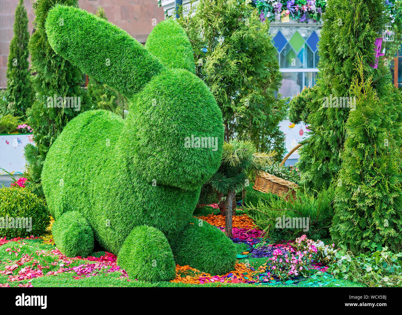 Easter bunny made from green grass using topiary technique Stock Photo