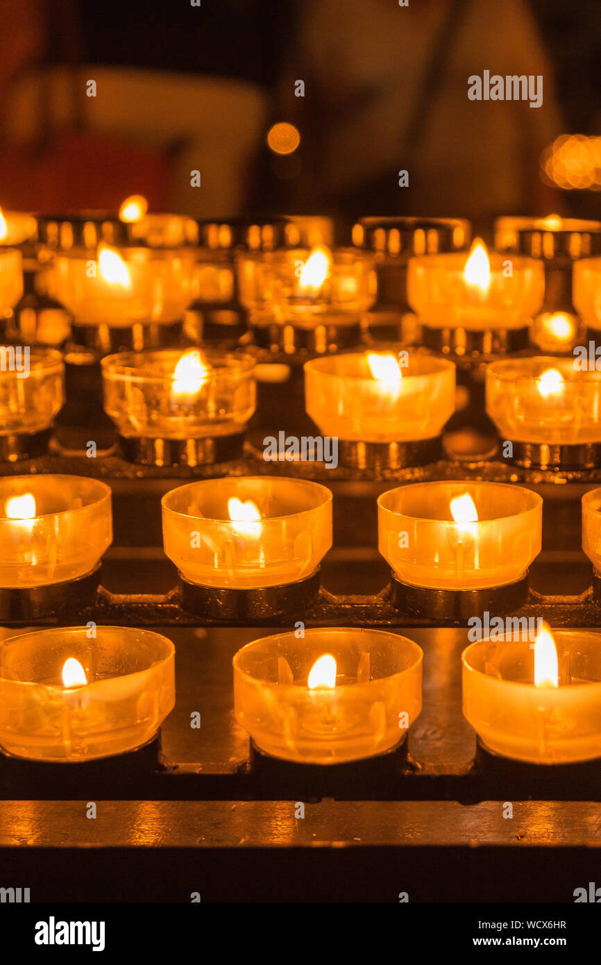 Lit Tea Light Candles On Altar Stock Photo Alamy