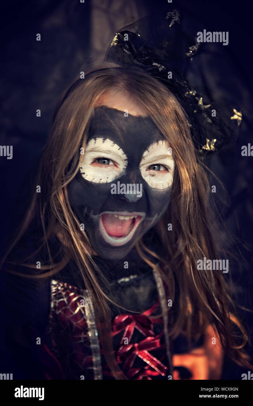Portrait Of Face Painted Girl With Halloween Stock Photo