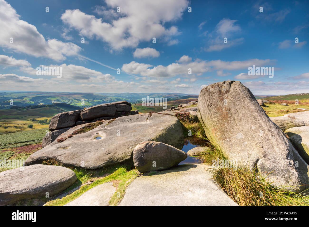 Millstone Edge rock formations on Millstone Edge at Hathersage in the Peak District Stock Photo