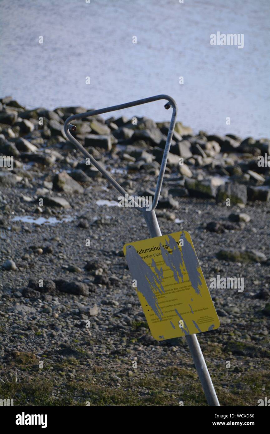 Abandoned Information Sign By Lake Stock Photo Alamy