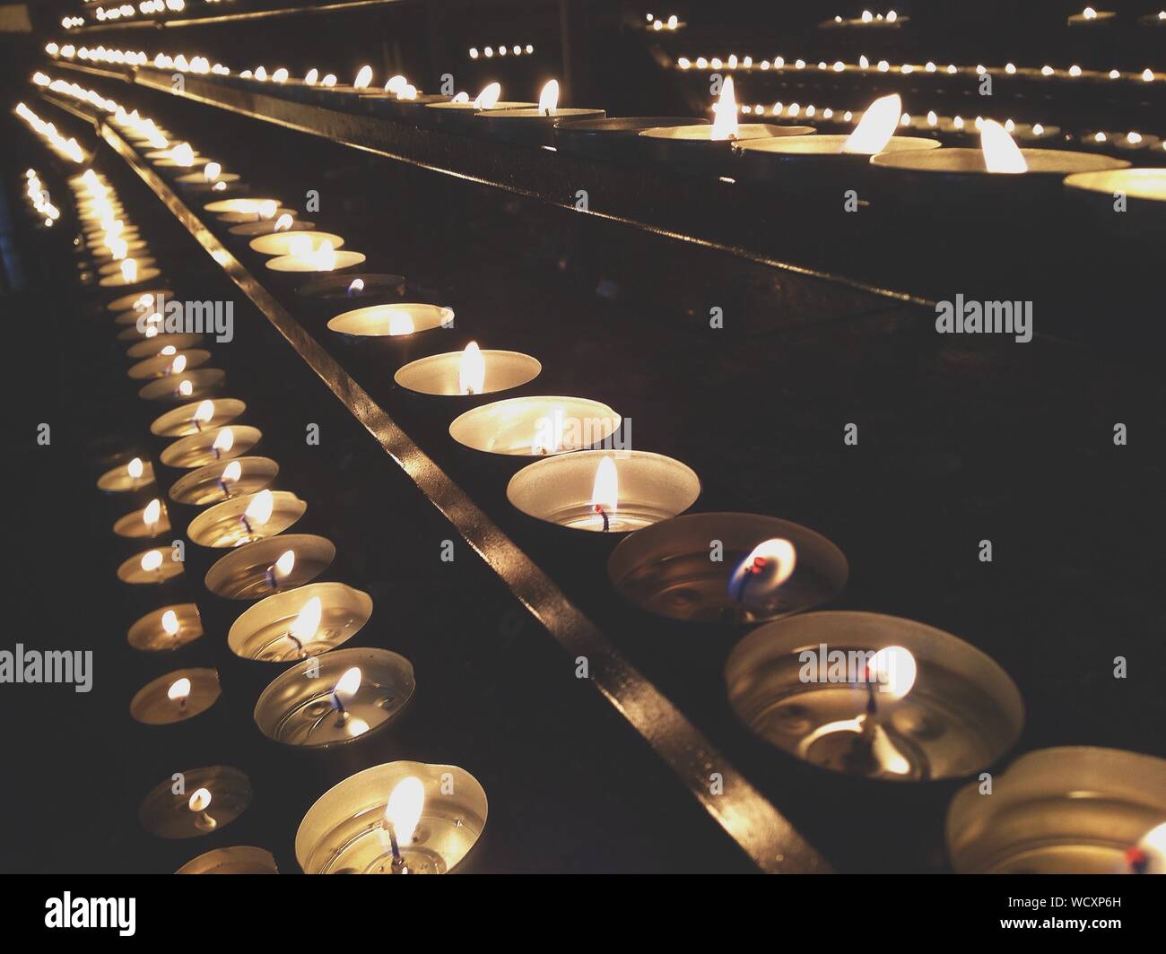Burning Votive Candles Stock Photo Alamy