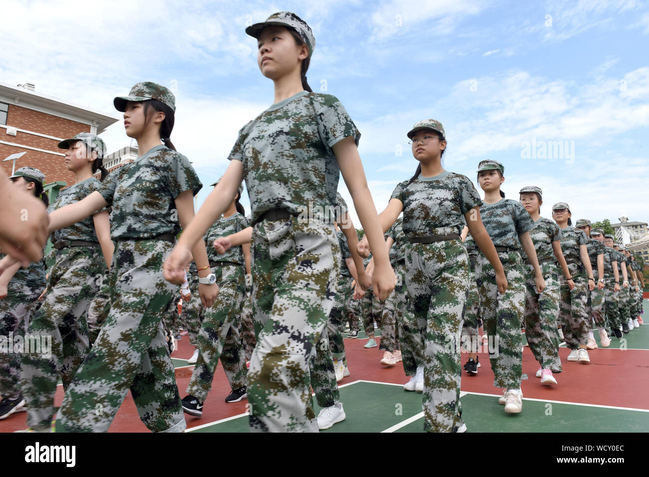 Anhui, Anhui, China. 28th Aug, 2019. Freshman of the second high school in Huainan, Anhui province, performs military boxing training on August 28, 2019.At the beginning of the new semester, more than 1,750 freshmen from Huainan no. 2 middle school in Anhui province have a one-week military training in formation, martial arts and rhythmic gymnastics.To temper the will, strengthen the physique, meet the arrival of the new semester. Credit: SIPA Asia/ZUMA Wire/Alamy Live News Stock Photo