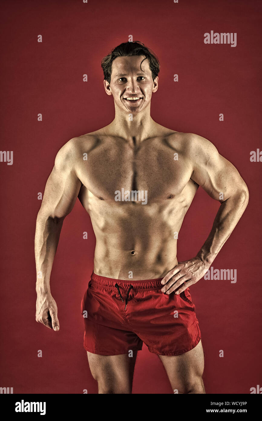 Attractive guy muscular chest. Proud of excellent shape. Man muscular  athlete stand confidently. Healthy and strong. Muscular bodybuilder  concept. Improve yourself. Macho handsome with muscular torso Stock Photo -  Alamy