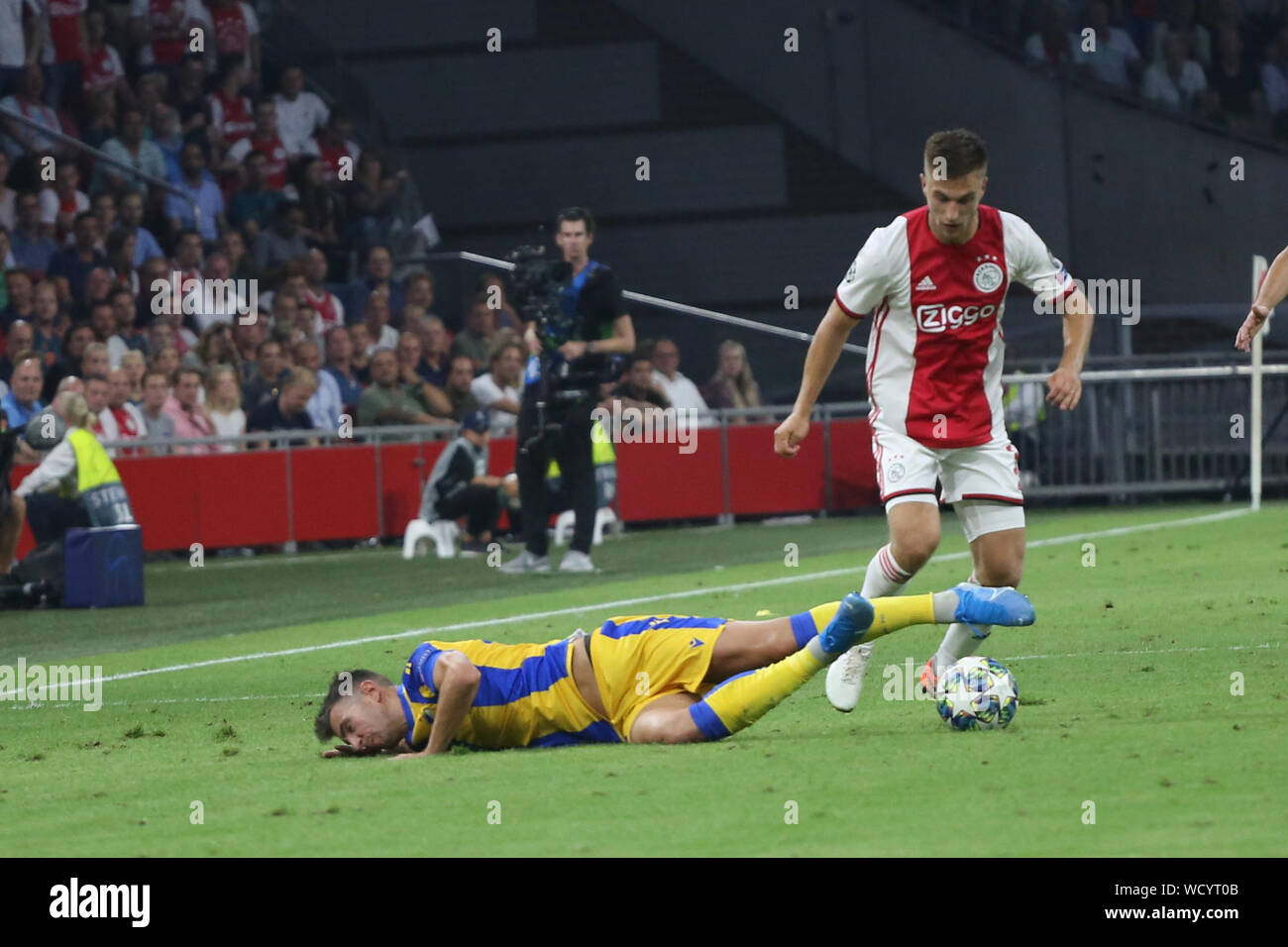Amsterdam, Netherlands. 28th August, 2019. Joel Veltman (Ajax) controls for the ball during the second leg of the 2019/20 UEFA Champions League Final Final Qualifying Round fixture between AFC Ajax (Netherlands) and Apoel FC (Cyprus) at Johan Cruijff ArenA. Credit: Federico Guerra Maranesi/ZUMA Wire/Alamy Live News Stock Photo