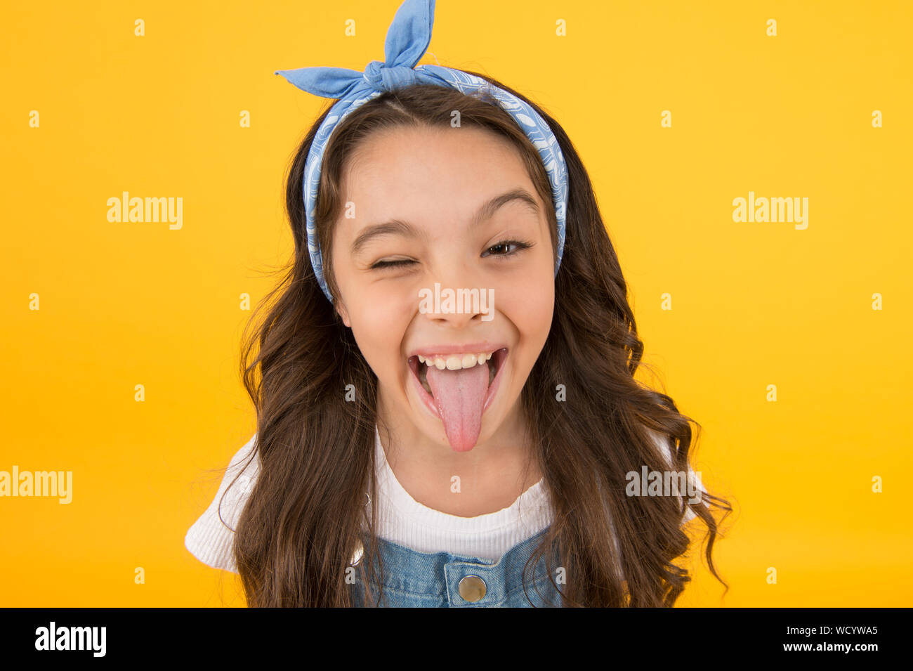 This how happiness looks like. Happy smiling kid girl close up face. Emotional expression. Express happiness. Emotional child concept. Mental health. Positive emotions. Cheerful teen. Feel happiness. Stock Photo