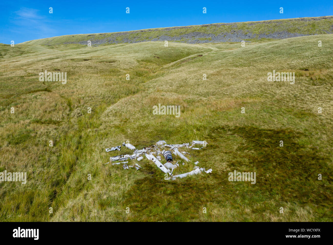 Aerial drone view of an old aircraft (Vampire) wreck on the slopes of Fan Hir in the Brecon Beacons, Wales Stock Photo