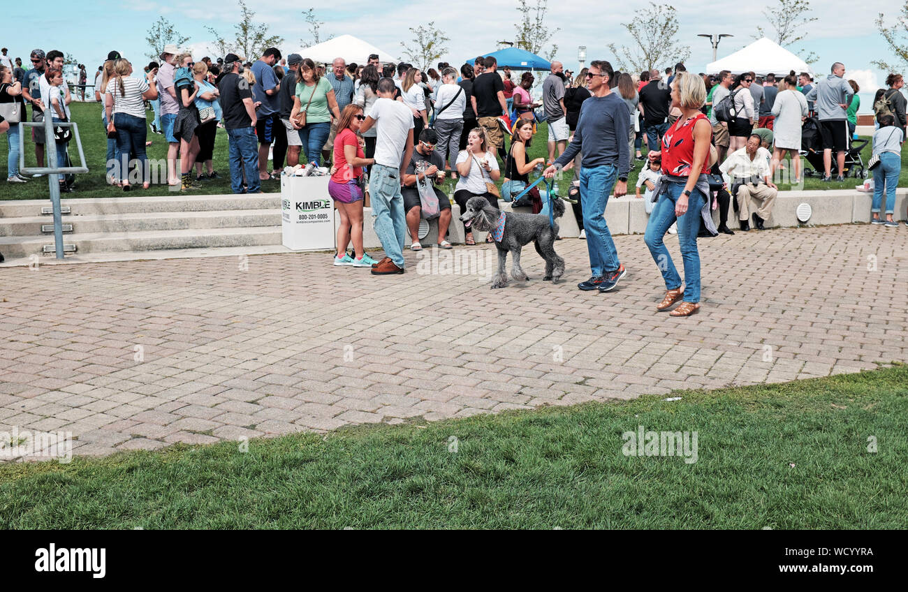 Crowds fill Voinovich Park on the Northcoast Harbor of Cleveland, Ohio during the 2019 Picklefest. Stock Photo