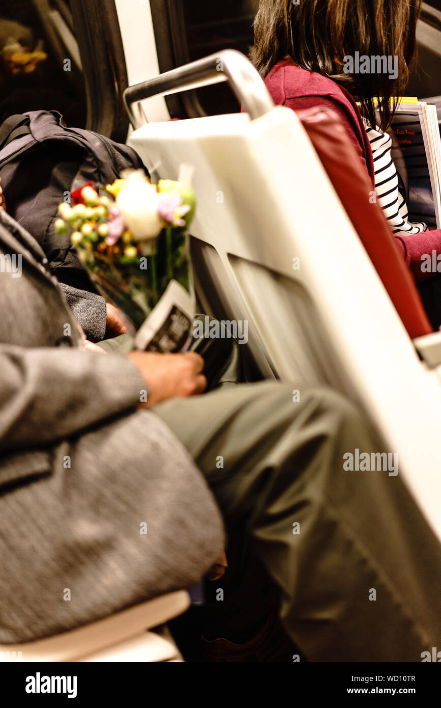 Commuter commuters sitting hires stock photography and images Alamy