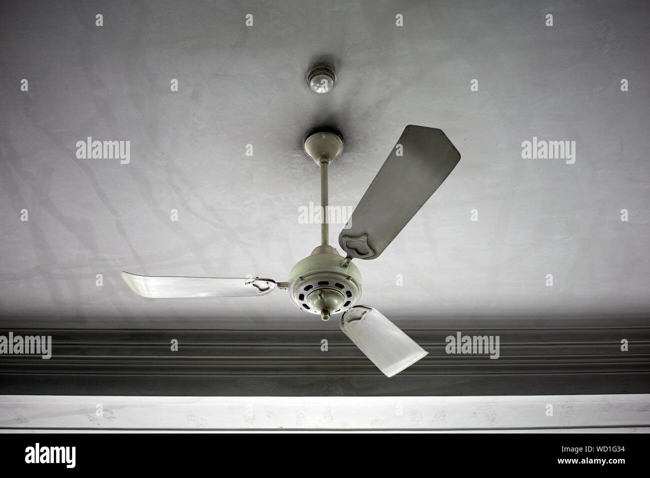 Low Angle View Of Old Fashioned Ceiling Fan Stock Photo