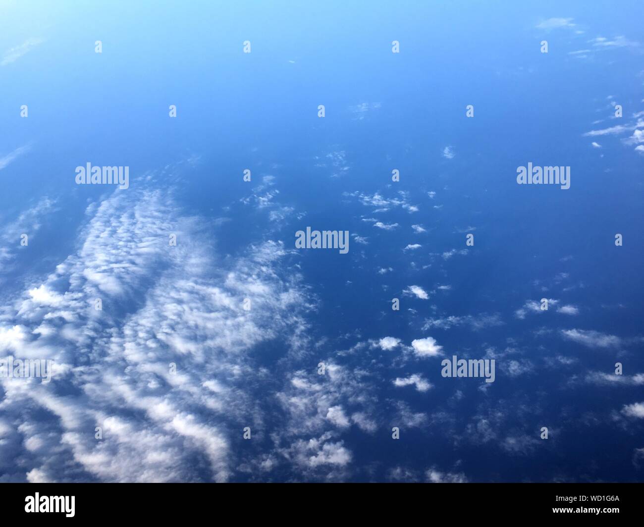 Low Angle View Of Blue Sky Over Sea Stock Photo