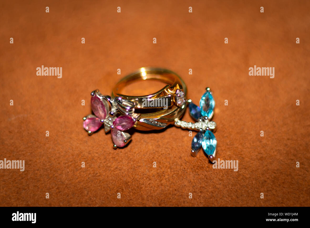 Macro photo of wedding rings and pendants Stock Photo