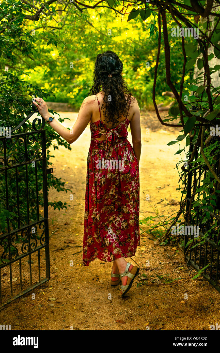 Black hair woman in red dress hi-res stock photography and images - Alamy