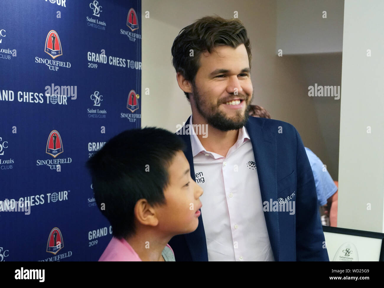 St. Louis, United States. 28th Aug, 2019. Chess Grand Master Magnus Carlsen of Norway, greets fans following the final round of play against Grand Master Maxime Vachier-Lagrave of France in the Sinquefield Cup tournament at the Saint Louis Chess Club in St. Louis on Wednesday, August 28, 2019.Carlsen defeated Vachier-Lagrave and will now face Grand Master Ding Liren of China for the championship on 8/29/2019. Photo by Bill Greenblatt/UPI Credit: UPI/Alamy Live News Stock Photo