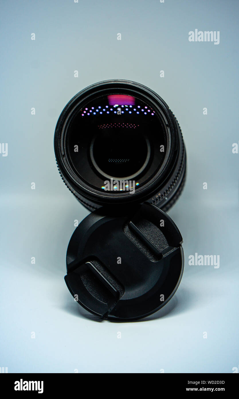 Close-up Of Telephoto Lens Against Gray Background Stock Photo
