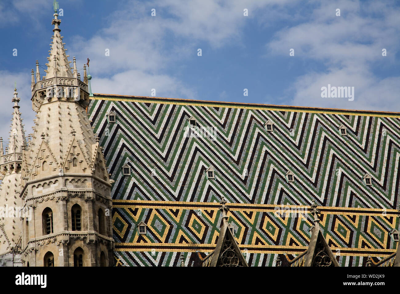 The multi-coloured geometric roof of St. Stephens Cathedral (Stephansdom) in the centre of Vienna Austria. Stock Photo