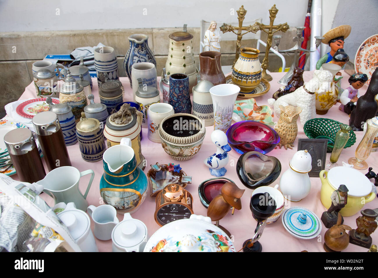 Bric-a-brac displayed on stall at the popular Naschmarkt open air market in Vienna Austria Stock Photo