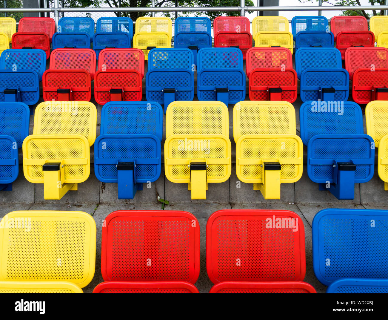 Folded Colorful Chairs At Stadium Stock Photo Alamy   Folded Colorful Chairs At Stadium WD2XBJ 