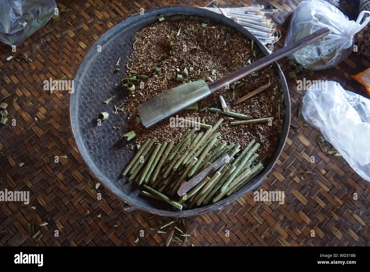High Angle View Of Rolled Up Leaves With Tabacco Stock Photo