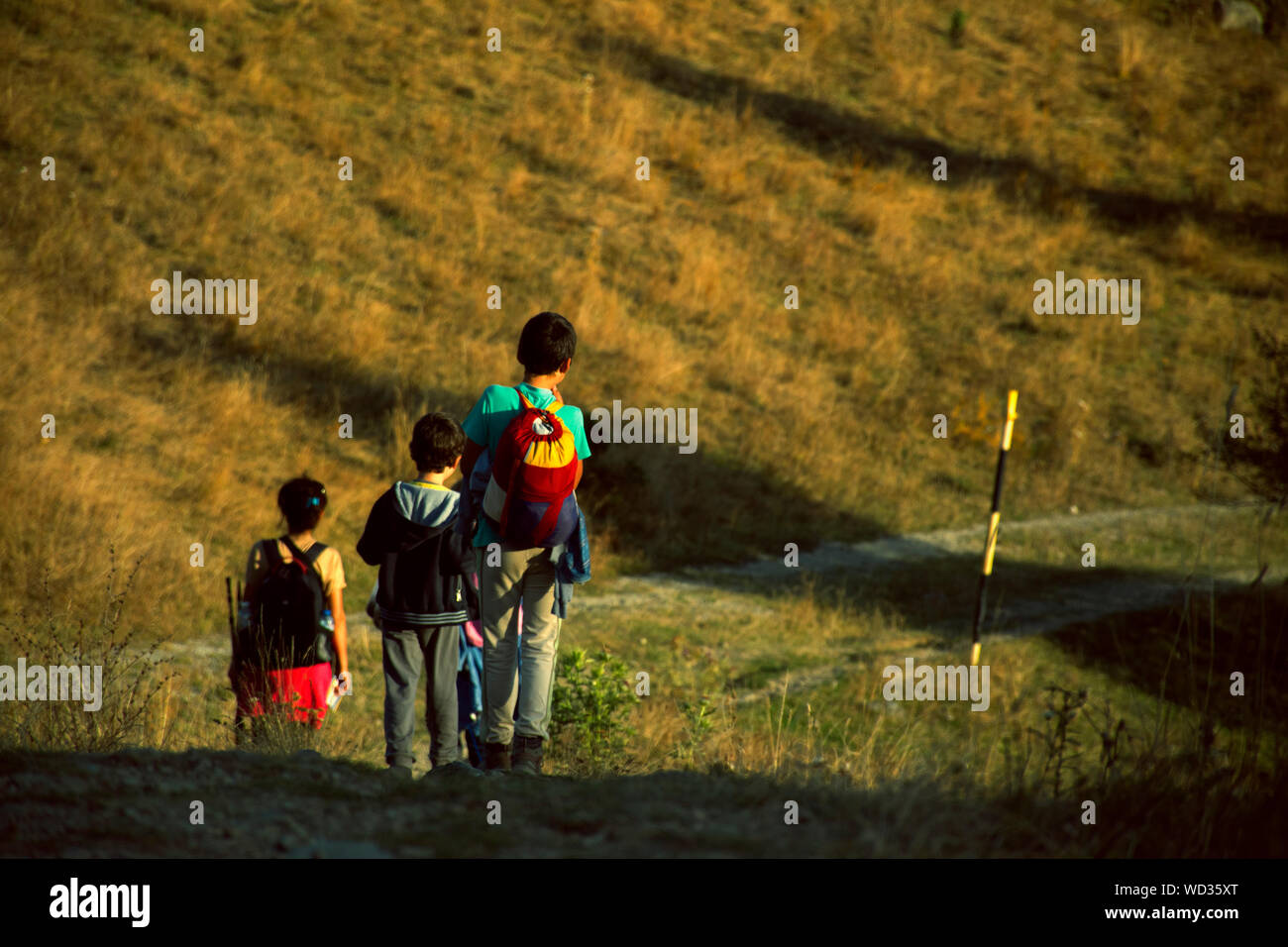 Children backpack walking hi-res stock photography and images - Alamy