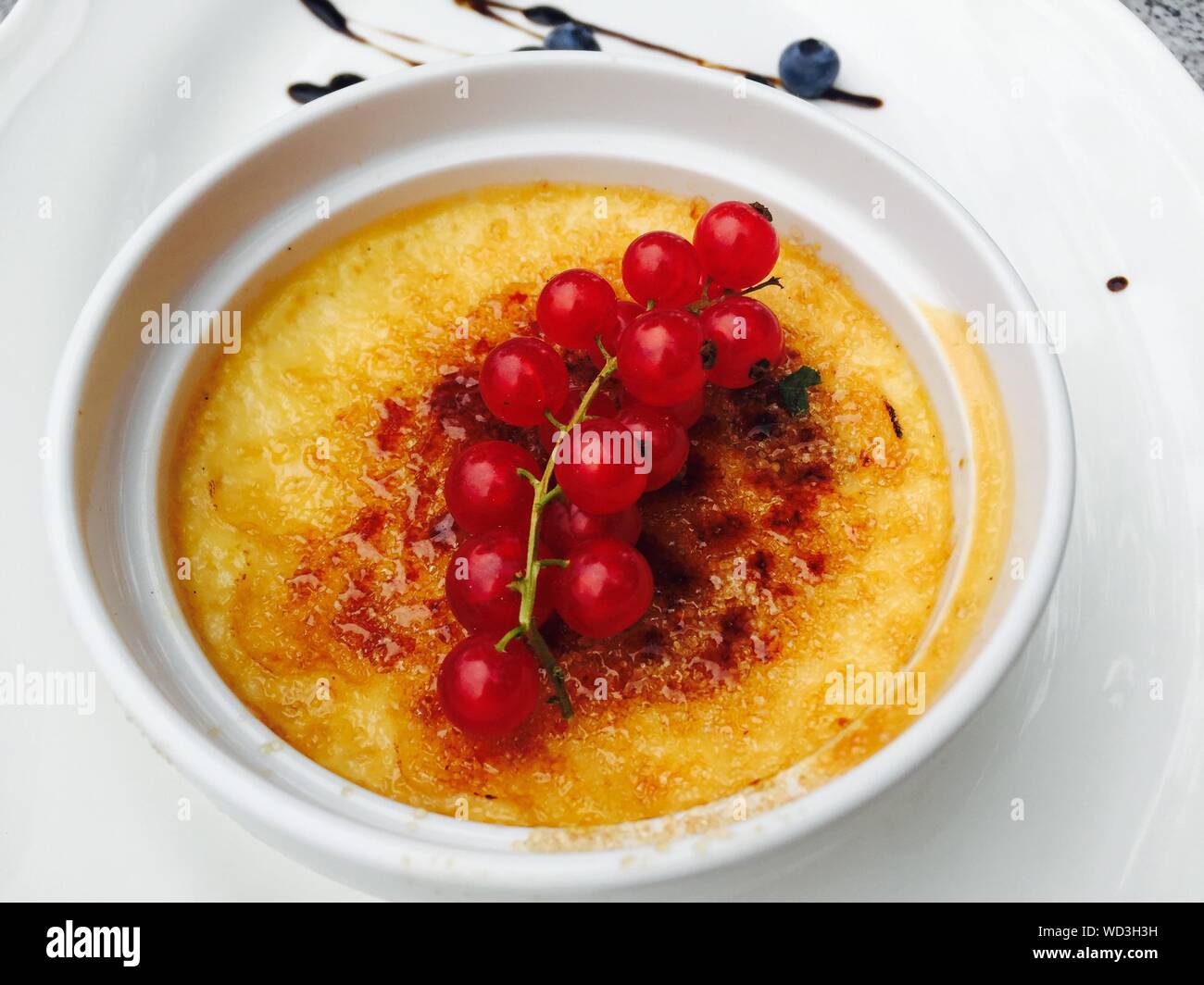 High Angle View Of Fresh Cherries Served With Creme Brulee In Bowl Stock  Photo - Alamy