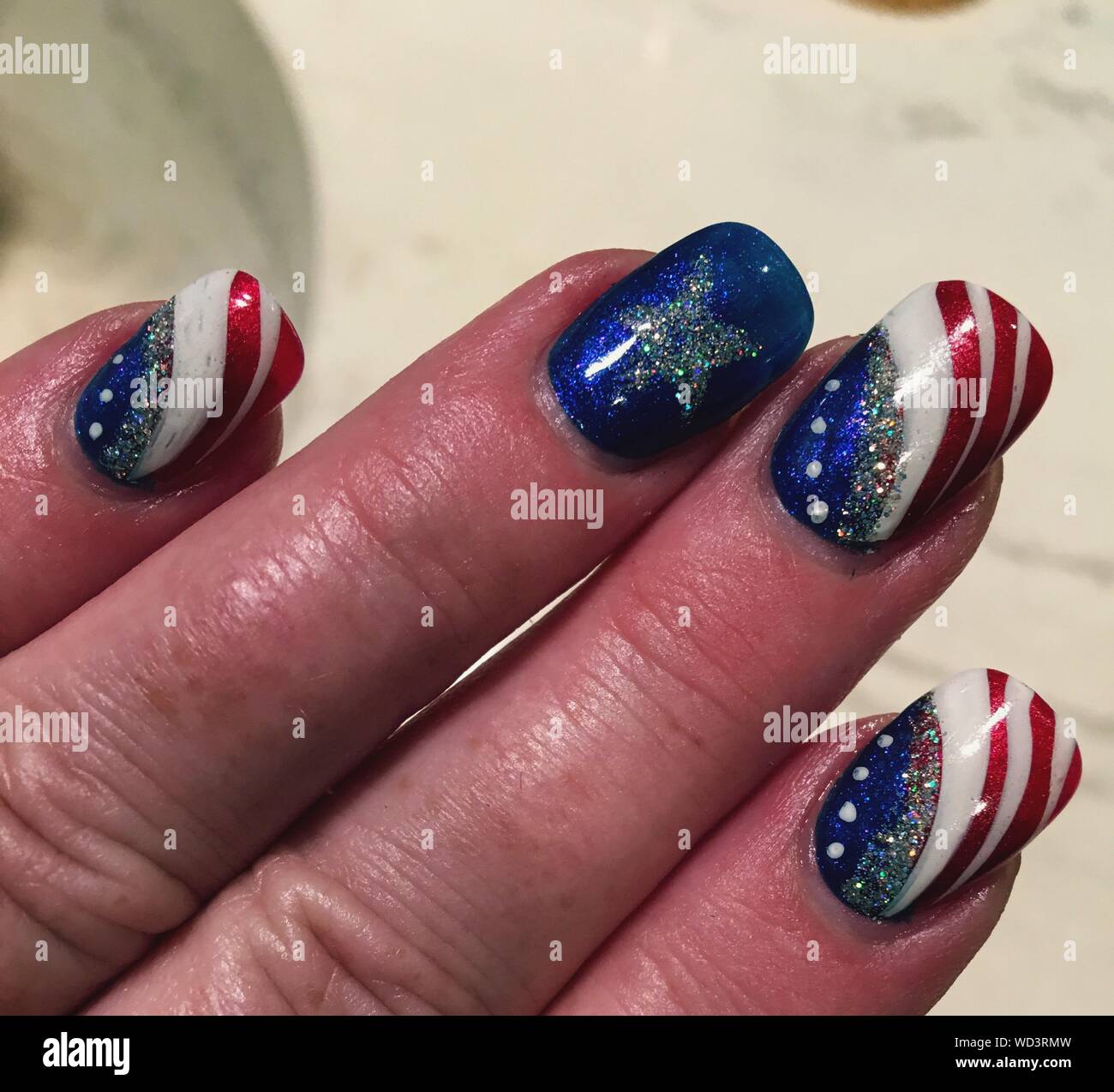 Cropped Hand Of Woman With American Flag Nail Art Stock Photo - Alamy