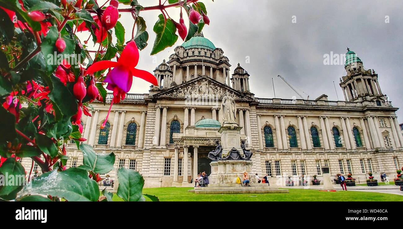 Belfast City Hallagainst Cloudy Sky Stock Photo