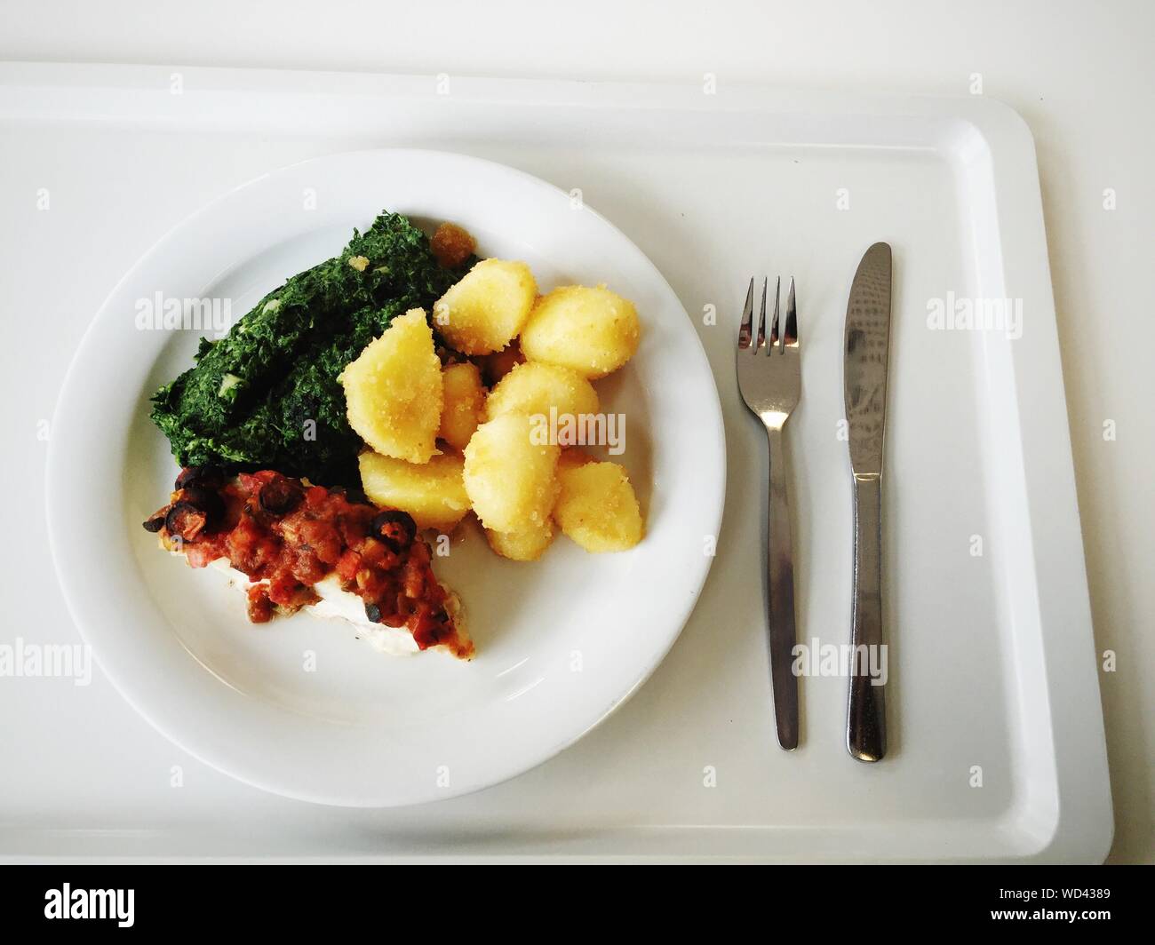 Fish With Gravy From Vegetables Stock Photo