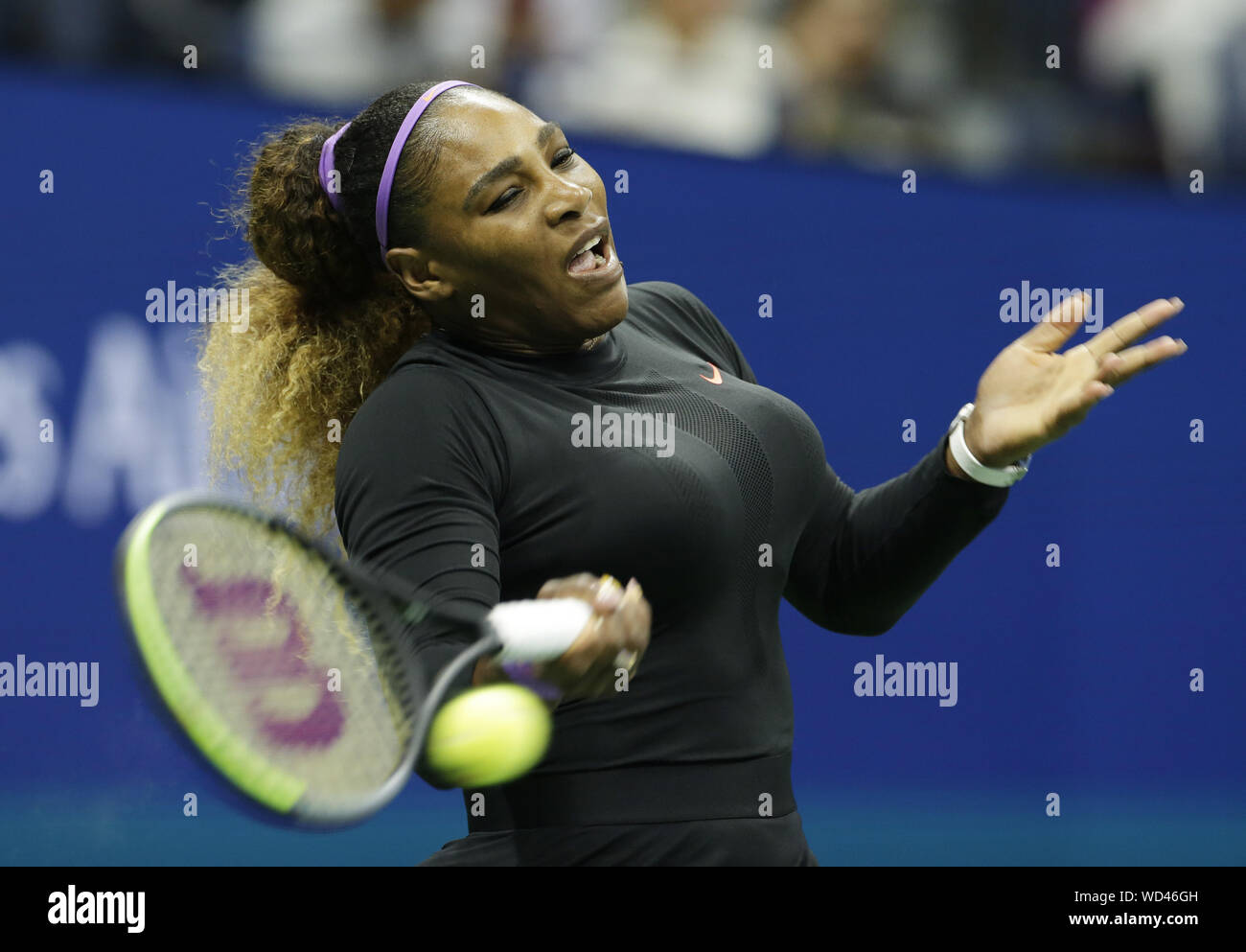 Flushing Meadow, United States. 28th Aug, 2019. Serena Williams hits a  forehand to Catherine McNally in the 2nd round in Arthur Ashe Stadium at  the 2019 US Open Tennis Championships at the