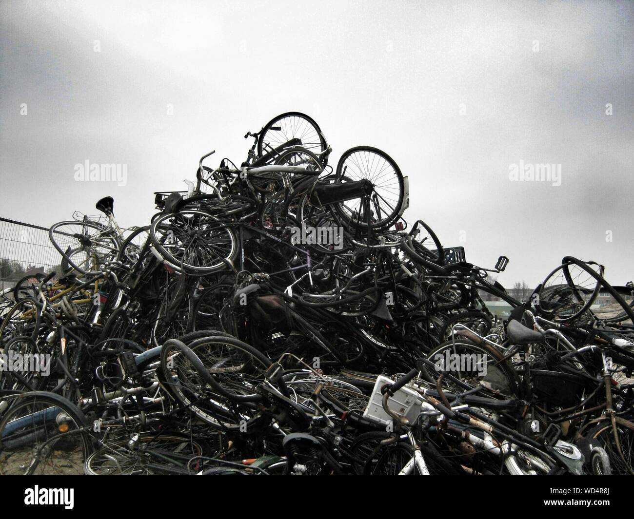 Stack Of Old Broken Bikes Stock Photo Alamy