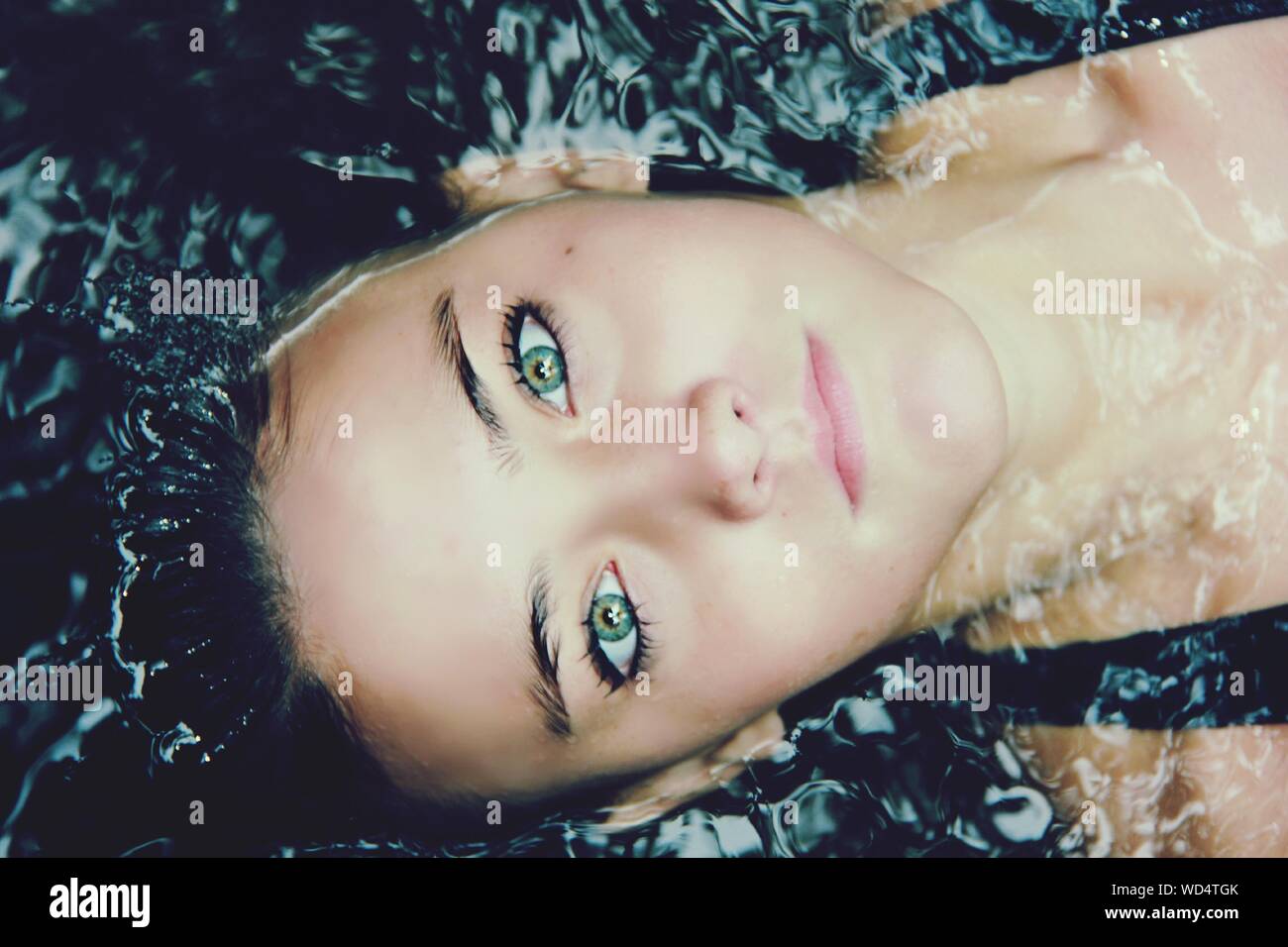 Young woman in the bathtub hi-res stock photography and images - Alamy